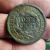 Reverse view showing ONE CENT within wreath and UNITED STATES OF AMERICA legend