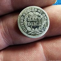 Reverse view showing HALF DIME legend within wreath