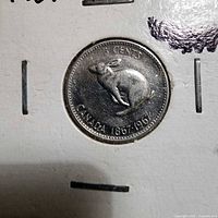 Reverse of 1967 Canadian 5-cent coin featuring rabbit