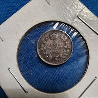 Reverse of 1906 Canada 5 cents showing crown, denomination and wreath