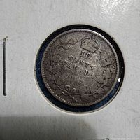 Reverse of 1907 Canada 10 cents coin showing crown, value, wreath