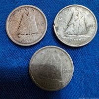 Group view of three Canadian dimes dated 1942, 1945, 1947