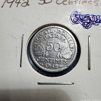 Coin reverse showing date, denomination and legend
