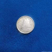 Reverse side showing Bluenose schooner, date 1942, TEN CENTS legend