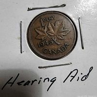 1945 Canadian 1-cent coin reverse with maple leaves
