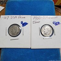 Both dimes in 2x2 holders side by side