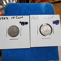 Both 1963 and 1964 dimes in holders