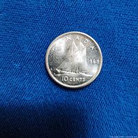 Reverse side showing Bluenose schooner and 1963 date