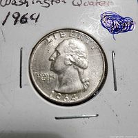 Obverse of 1964 Washington Quarter in cardboard flip