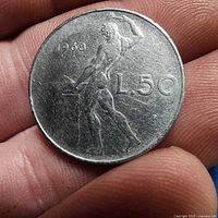 Reverse of 1968 Italian 50 Lire coin showing Vulcan and date