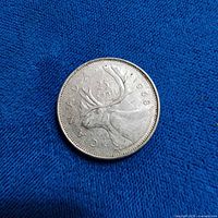 Reverse showing caribou and 1968 date