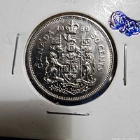 Reverse showing Canadian coat of arms, date 1969 and denomination 50 CENTS
