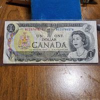 Full view of 1973 $1 note in sleeve