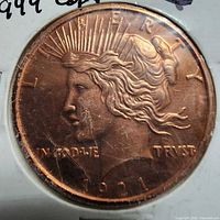 Obverse of copper round showing Liberty head and date 1921
