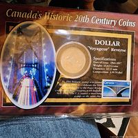 Front of display card showing coin, stamp and series title