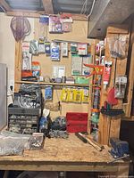 overall workbench view with hanging hardware and tools