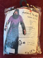 Costume packaging showing Phantom of the Night artwork and item details