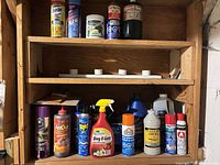 Overview of shelves with all cans, bottles and jugs visible