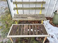 Front view of both benches showing design and wear