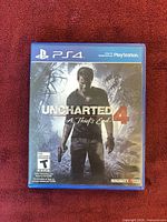 Front view of PS4 Uncharted 4 case showing cover art and rating