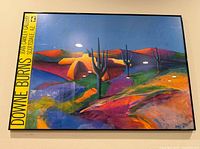 Full view of framed Downie Burns exhibition poster