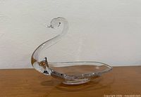 angled side view showing swan profile and bowl shape