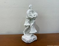 Front angled view of white resin Holy Family sculpture