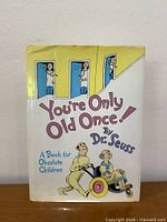 Front cover of Dr. Seuss book with dust jacket displayed upright