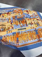 Full view of Hermès silk carré scarf showing Deauville racecourse scene and border