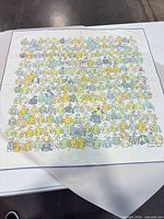 Full view of scarf laid flat showing pattern and border