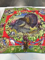 Full view of Hermès silk scarf showing complete Texas wildlife design