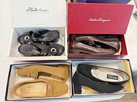 Four shoe boxes open showing each pair