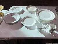 Overview of dinnerware pieces on table