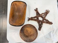 Wood trencher bowl, wicker basket and twig star overview