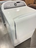 Front angled view of full dryer including door and control panel