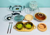 Overview of all serving and warming items laid out