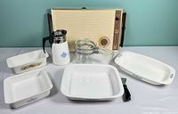 Group shot of all items including warming tray, percolator, glass saucepan, four bakeware dishes and handle