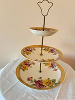 Front view of assembled 3-tier stand on table