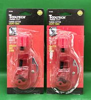 Front view showing two sealed Tooltech Firm-Grip tubing cutters in packaging