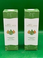 Front view of two sealed Bona Dea Naturals feminine oil spray boxes
