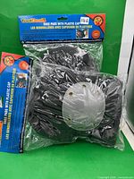 Two sealed packages of ToolDeal knee pads, full view