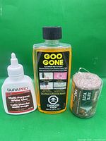 Front view of all three items: Goo Gone cleaner, DuraPro glue, Jute Yute cord