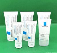 Front view of six La Roche-Posay tubes showing product types and sizes