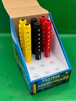 Boxed set showing six flashlights upright with LEDs visible, packaging identifies brand and model