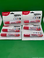 Six SigmaFlo markers on cards