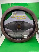 Front view of Alpena Luxurious Leather steering wheel cover in packaging