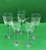 Group shot of five La Mediterranea stemmed glasses