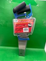 Front view of sealed ToolDeal 2-piece mini saw set showing branding and tools