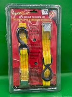 Front view of sealed ToolDeal 2-pc buckle tie-down set showing both straps
