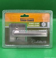 Front of sealed package showing Tough Guard dummy lever handle